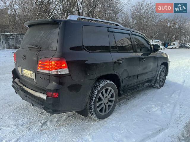 Черный Лексус ЛХ, объемом двигателя 5.66 л и пробегом 207 тыс. км за 41000 $, фото 1 на Automoto.ua