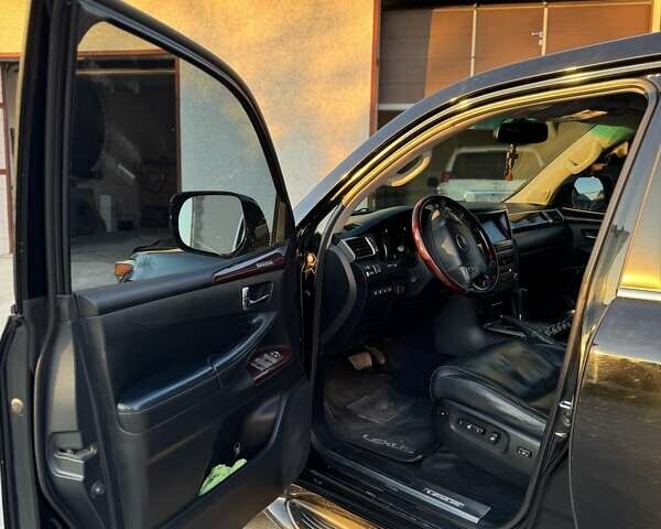 Черный Лексус ЛХ, объемом двигателя 5.66 л и пробегом 227 тыс. км за 39500 $, фото 6 на Automoto.ua