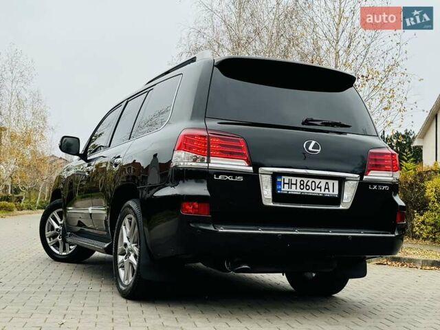 Черный Лексус ЛХ, объемом двигателя 5.66 л и пробегом 176 тыс. км за 35500 $, фото 7 на Automoto.ua