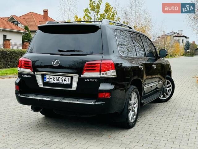 Черный Лексус ЛХ, объемом двигателя 5.66 л и пробегом 176 тыс. км за 35500 $, фото 3 на Automoto.ua