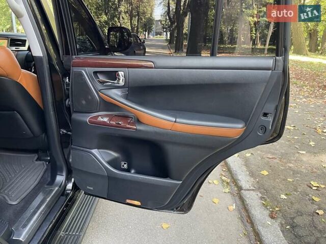 Черный Лексус ЛХ, объемом двигателя 5.66 л и пробегом 130 тыс. км за 46500 $, фото 13 на Automoto.ua
