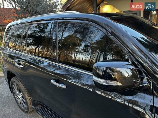 Черный Лексус ЛХ, объемом двигателя 5.66 л и пробегом 294 тыс. км за 59500 $, фото 26 на Automoto.ua