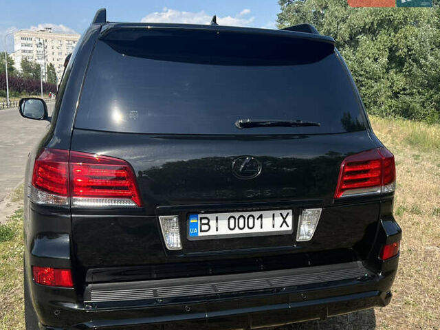 Черный Лексус ЛХ, объемом двигателя 5.66 л и пробегом 165 тыс. км за 40500 $, фото 2 на Automoto.ua