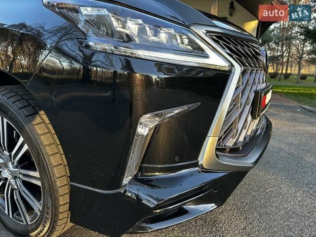 Черный Лексус ЛХ, объемом двигателя 5.66 л и пробегом 294 тыс. км за 59500 $, фото 16 на Automoto.ua