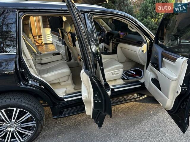 Черный Лексус ЛХ, объемом двигателя 5.66 л и пробегом 294 тыс. км за 59500 $, фото 28 на Automoto.ua