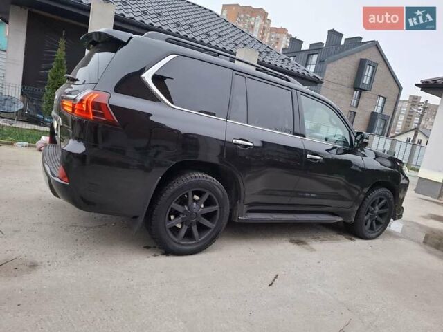 Черный Лексус ЛХ, объемом двигателя 4.46 л и пробегом 187 тыс. км за 65000 $, фото 1 на Automoto.ua