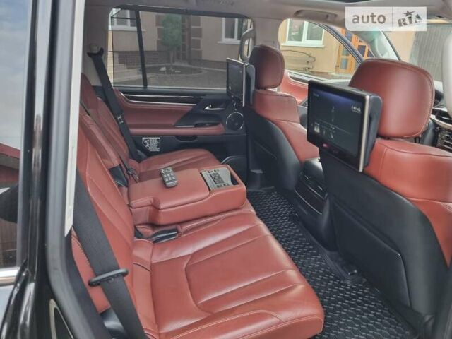 Черный Лексус ЛХ, объемом двигателя 5.66 л и пробегом 156 тыс. км за 67000 $, фото 4 на Automoto.ua