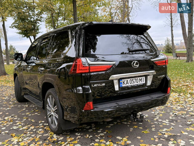 Черный Лексус ЛХ, объемом двигателя 5.7 л и пробегом 145 тыс. км за 65000 $, фото 1 на Automoto.ua