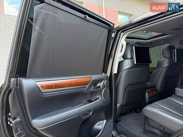 Черный Лексус ЛХ, объемом двигателя 5.66 л и пробегом 142 тыс. км за 60500 $, фото 51 на Automoto.ua