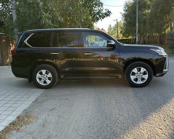 Черный Лексус ЛХ, объемом двигателя 4.46 л и пробегом 150 тыс. км за 64500 $, фото 7 на Automoto.ua