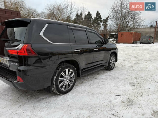 Черный Лексус ЛХ, объемом двигателя 4.46 л и пробегом 126 тыс. км за 63000 $, фото 6 на Automoto.ua