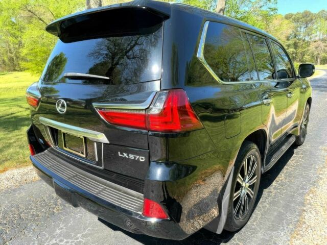 Черный Лексус ЛХ, объемом двигателя 5.7 л и пробегом 45 тыс. км за 36000 $, фото 3 на Automoto.ua