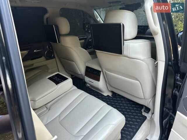 Черный Лексус ЛХ, объемом двигателя 5.66 л и пробегом 298 тыс. км за 65000 $, фото 50 на Automoto.ua