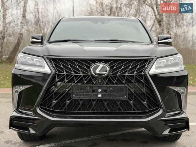 Черный Лексус ЛХ, объемом двигателя 5.66 л и пробегом 55 тыс. км за 81900 $, фото 1 на Automoto.ua