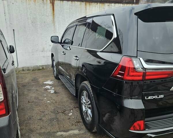 Черный Лексус ЛХ, объемом двигателя 4.46 л и пробегом 57 тыс. км за 82000 $, фото 4 на Automoto.ua