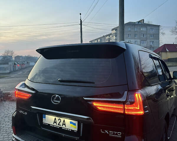 Черный Лексус ЛХ, объемом двигателя 5.66 л и пробегом 60 тыс. км за 101000 $, фото 6 на Automoto.ua