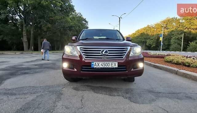 Червоний Лексус ЛХ, об'ємом двигуна 5.66 л та пробігом 245 тис. км за 26500 $, фото 1 на Automoto.ua