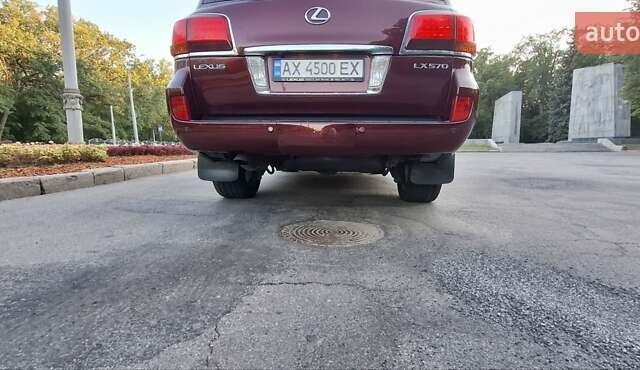 Червоний Лексус ЛХ, об'ємом двигуна 5.66 л та пробігом 245 тис. км за 26500 $, фото 5 на Automoto.ua