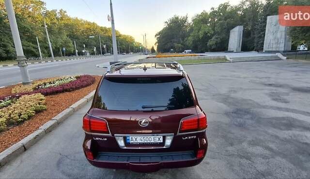 Червоний Лексус ЛХ, об'ємом двигуна 5.66 л та пробігом 245 тис. км за 26500 $, фото 24 на Automoto.ua