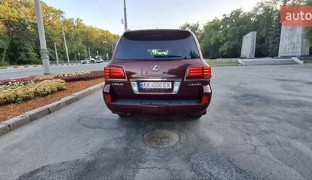 Червоний Лексус ЛХ, об'ємом двигуна 5.66 л та пробігом 245 тис. км за 26500 $, фото 2 на Automoto.ua