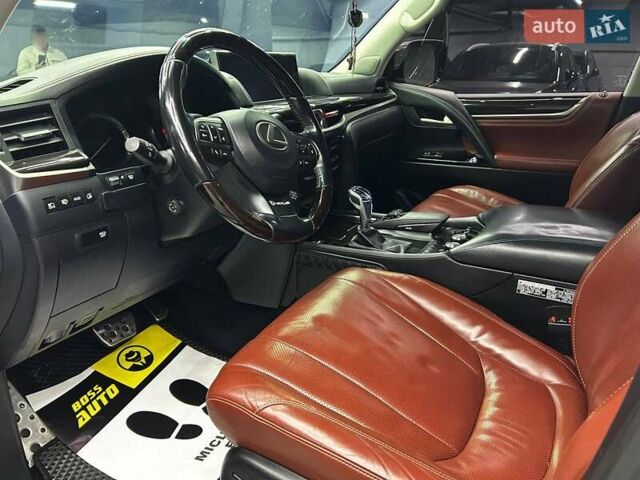 Красный Лексус ЛХ, объемом двигателя 5.7 л и пробегом 149 тыс. км за 74999 $, фото 7 на Automoto.ua