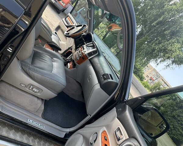 Лексус ЛХ, об'ємом двигуна 4.7 л та пробігом 285 тис. км за 15600 $, фото 6 на Automoto.ua