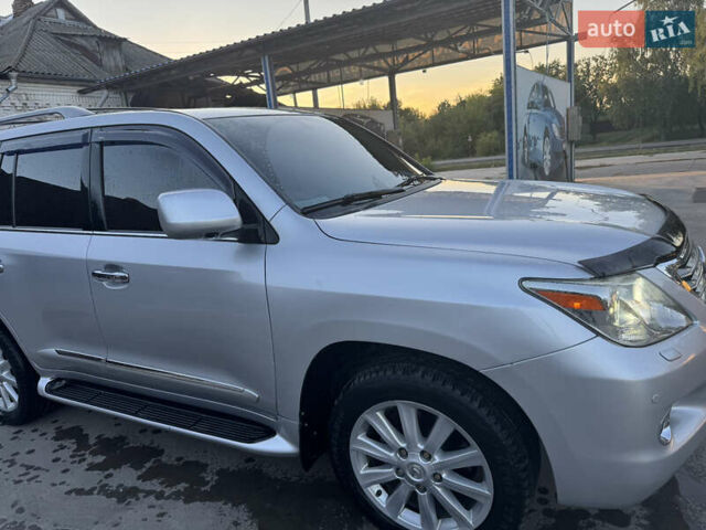 Сірий Лексус ЛХ, об'ємом двигуна 5.7 л та пробігом 315 тис. км за 22800 $, фото 6 на Automoto.ua