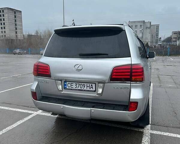 Сірий Лексус ЛХ, об'ємом двигуна 5.66 л та пробігом 225 тис. км за 22900 $, фото 2 на Automoto.ua