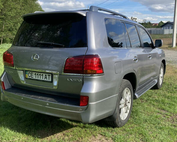 Серый Лексус ЛХ, объемом двигателя 5.66 л и пробегом 245 тыс. км за 29700 $, фото 2 на Automoto.ua
