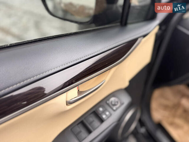 Черный Лексус НХ, объемом двигателя 2.5 л и пробегом 224 тыс. км за 24300 $, фото 18 на Automoto.ua