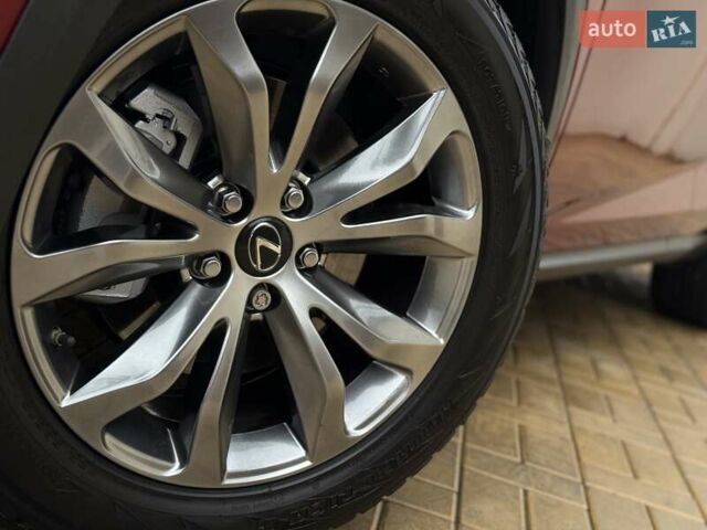 Красный Лексус НХ, объемом двигателя 2 л и пробегом 125 тыс. км за 24800 $, фото 18 на Automoto.ua