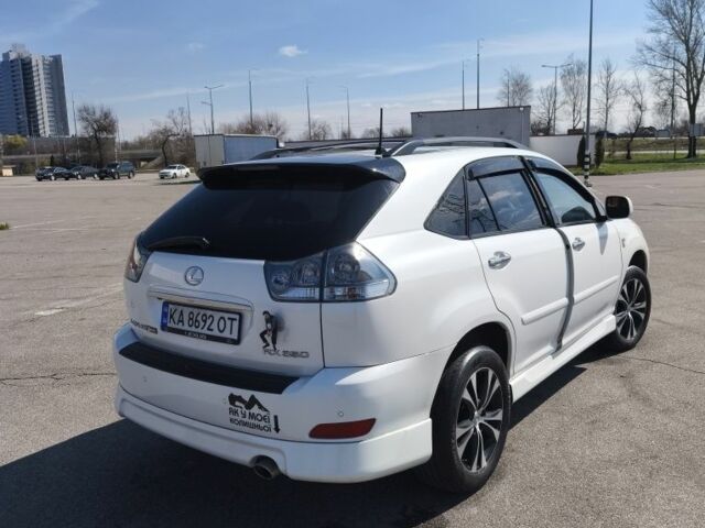 Білий Лексус РХ, об'ємом двигуна 3.5 л та пробігом 252 тис. км за 12500 $, фото 1 на Automoto.ua