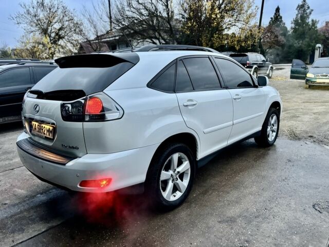 Белый Лексус РХ, объемом двигателя 3.3 л и пробегом 239 тыс. км за 8800 $, фото 5 на Automoto.ua