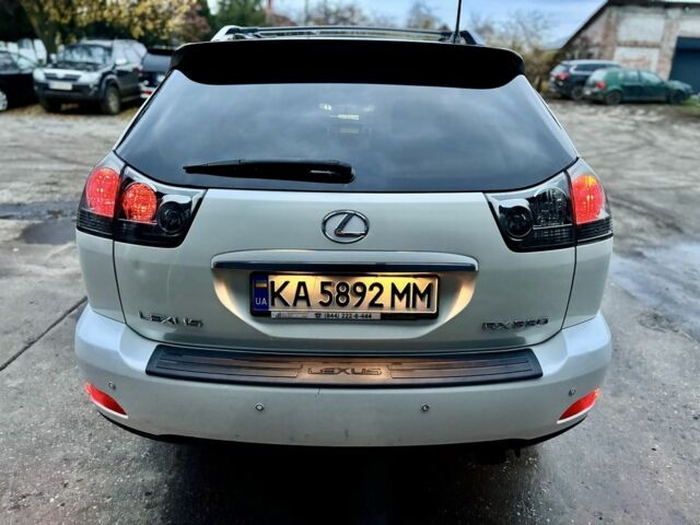 Белый Лексус РХ, объемом двигателя 3.3 л и пробегом 239 тыс. км за 8800 $, фото 4 на Automoto.ua