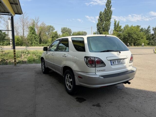 Белый Лексус РХ, объемом двигателя 3 л и пробегом 312 тыс. км за 3400 $, фото 3 на Automoto.ua