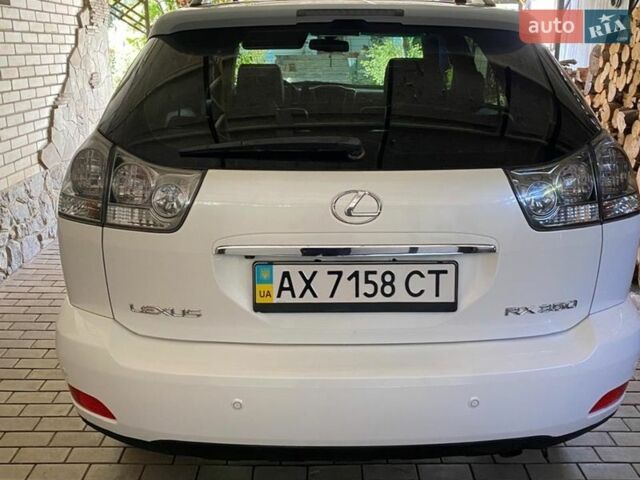 Белый Лексус РХ, объемом двигателя 3.5 л и пробегом 111 тыс. км за 15000 $, фото 4 на Automoto.ua