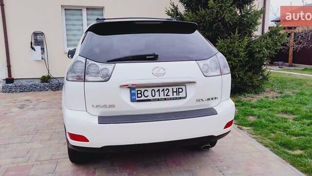 Білий Лексус РХ, об'ємом двигуна 3.31 л та пробігом 272 тис. км за 11000 $, фото 9 на Automoto.ua