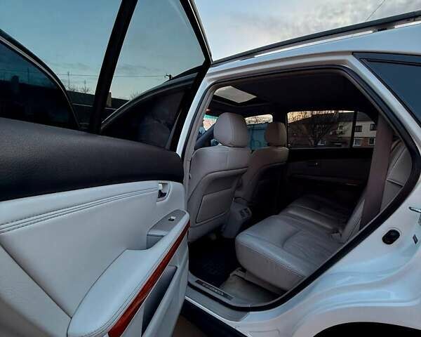 Белый Лексус РХ, объемом двигателя 3.5 л и пробегом 320 тыс. км за 12700 $, фото 12 на Automoto.ua