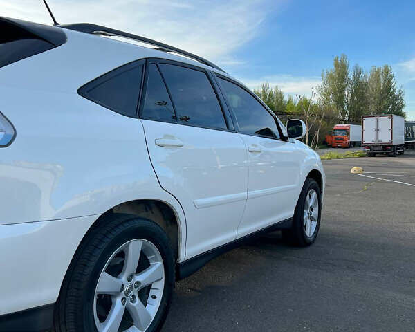 Белый Лексус РХ, объемом двигателя 3.46 л и пробегом 142 тыс. км за 11900 $, фото 17 на Automoto.ua