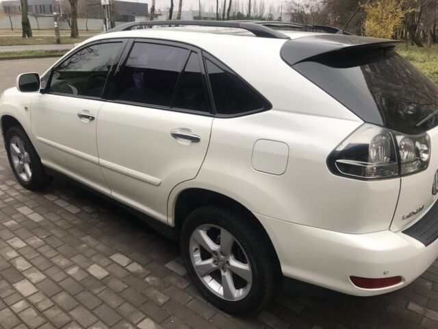 Белый Лексус РХ, объемом двигателя 3.5 л и пробегом 243 тыс. км за 10800 $, фото 1 на Automoto.ua