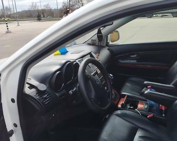 Белый Лексус РХ, объемом двигателя 3.5 л и пробегом 252 тыс. км за 12500 $, фото 4 на Automoto.ua