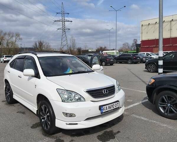 Белый Лексус РХ, объемом двигателя 3.5 л и пробегом 252 тыс. км за 12500 $, фото 2 на Automoto.ua