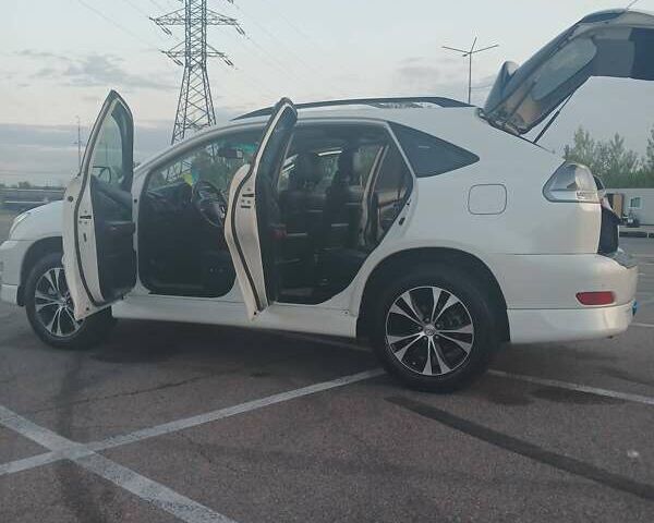 Белый Лексус РХ, объемом двигателя 3.5 л и пробегом 252 тыс. км за 12500 $, фото 19 на Automoto.ua