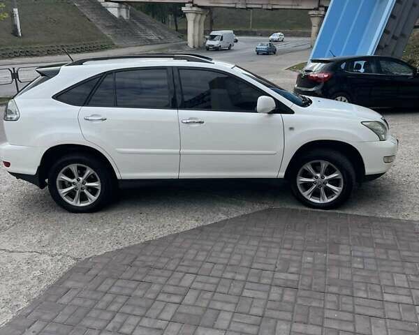 Белый Лексус РХ, объемом двигателя 3.5 л и пробегом 167 тыс. км за 12500 $, фото 4 на Automoto.ua