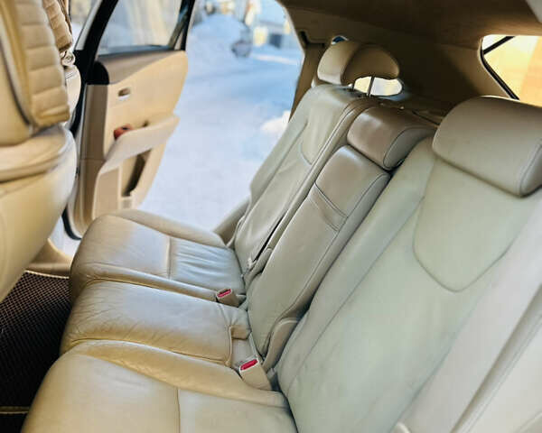 Белый Лексус РХ, объемом двигателя 3.5 л и пробегом 172 тыс. км за 15800 $, фото 2 на Automoto.ua