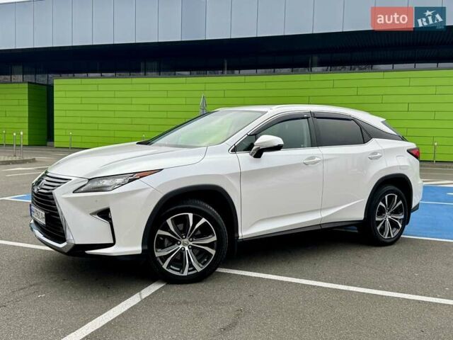 Белый Лексус РХ, объемом двигателя 2 л и пробегом 70 тыс. км за 32900 $, фото 2 на Automoto.ua