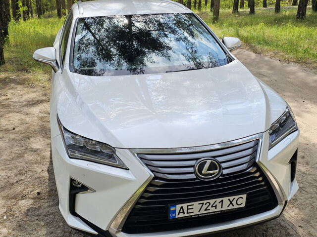 Білий Лексус РХ, об'ємом двигуна 2 л та пробігом 105 тис. км за 35400 $, фото 2 на Automoto.ua