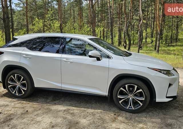 Белый Лексус РХ, объемом двигателя 2 л и пробегом 105 тыс. км за 35400 $, фото 1 на Automoto.ua