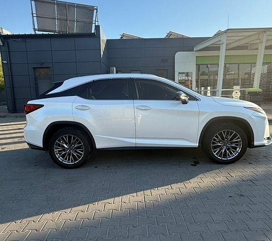 Белый Лексус РХ, объемом двигателя 3.5 л и пробегом 145 тыс. км за 32000 $, фото 4 на Automoto.ua