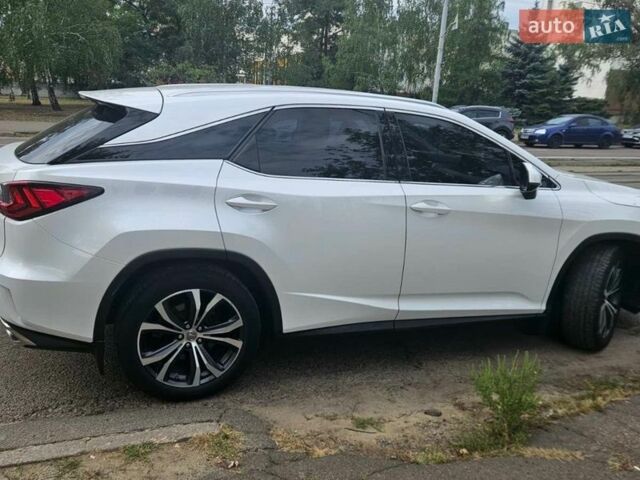 Белый Лексус РХ, объемом двигателя 2 л и пробегом 175 тыс. км за 28000 $, фото 1 на Automoto.ua